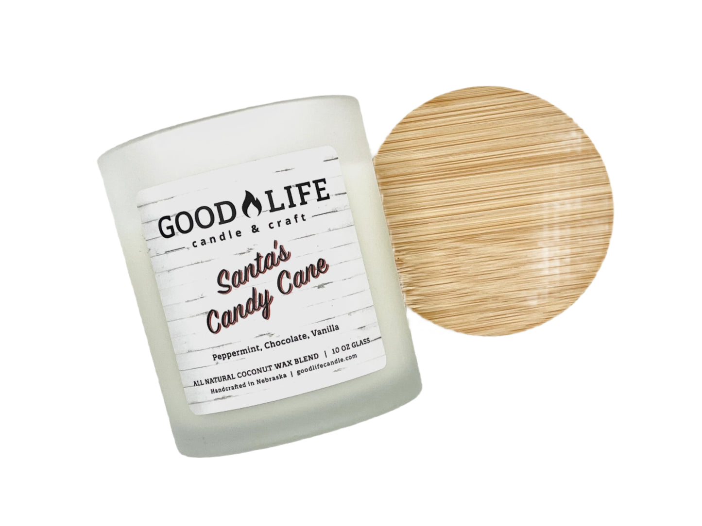 A white candle jar with a wooden lid labeled 'Santa's Candy Cane' from Good Life Candle & Craft. The candle is scented with peppermint and has notes of chocolate and vanilla.